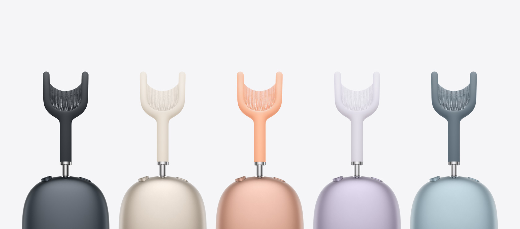 A side-view of five AirPods Max's - The colors are Midnight, Starlight, Orange, Purple and Blue.